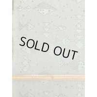 生地：魚柄穴あき加工綿ニット（緑）