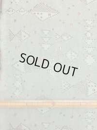 生地：魚柄穴あき加工綿ニット（緑）