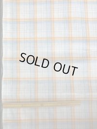 生地：ラミネート加工チェック柄大（オレンジ）