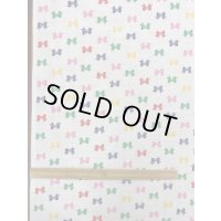 生地：リボン柄コットン（白）