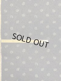 生地：ヘリンボーン水玉プリントポリエステル（茶／ベージュ）