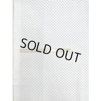 生地：ポリエステル100％水玉柄プリント（白／黒）