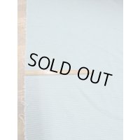 生地：針抜きダブルフェイスキルトニット（グレー／グリーン）