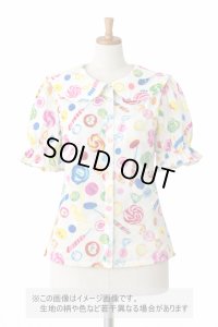 生地：ポリエステル100％ キャンディ柄プリント（白）