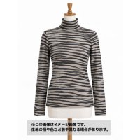生地：ポリエステル100％ ゼブラ柄プリントニット（薄茶地／ブラック）